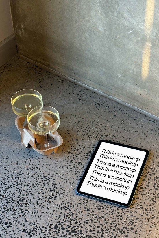 iPad Champagne Concrete Wall Mockup - Mock Exchange