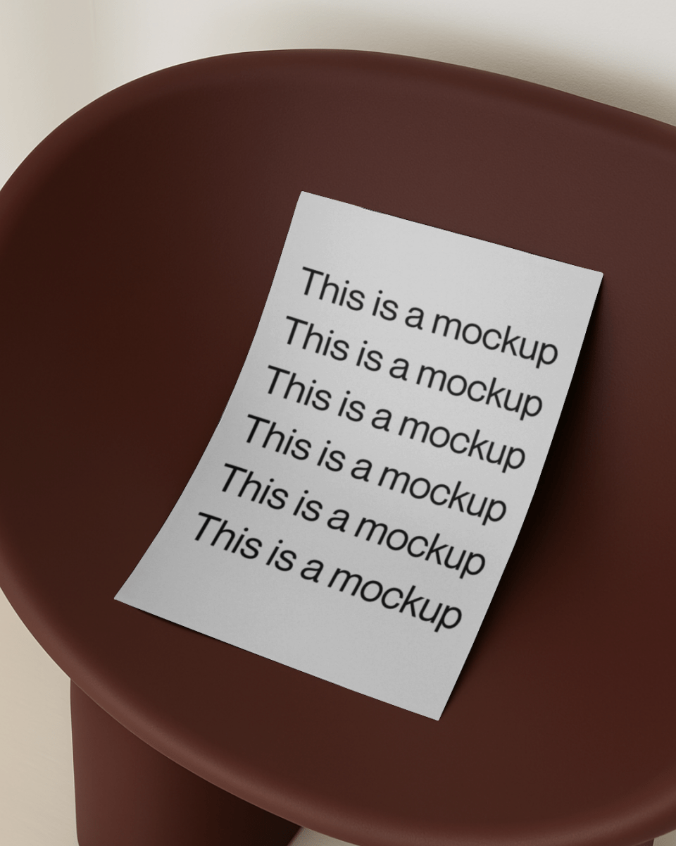 Poster on Burgundy Chair - Mock Exchange