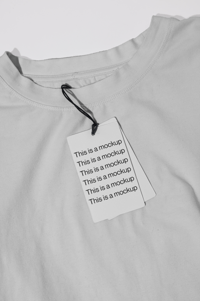 Swing Tag Mockup on T-shirt - Mock Exchange