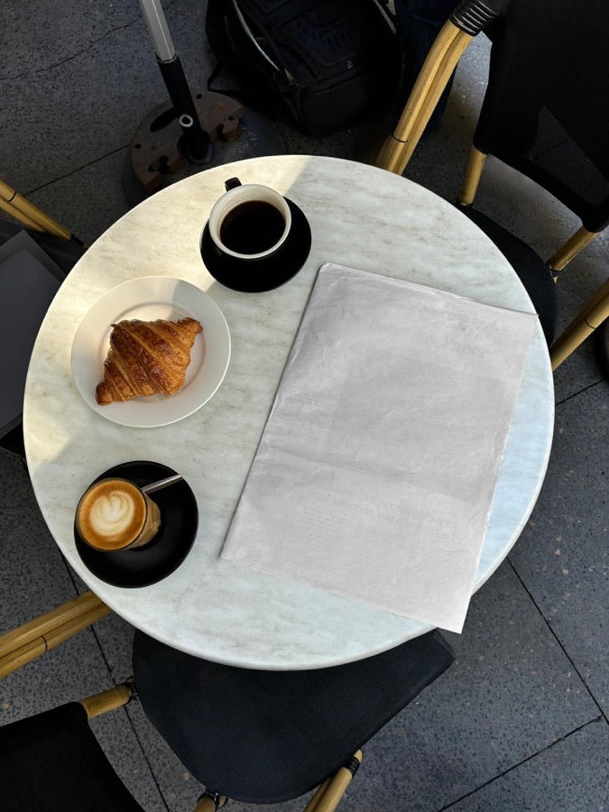 Newspaper, cafe table, blank